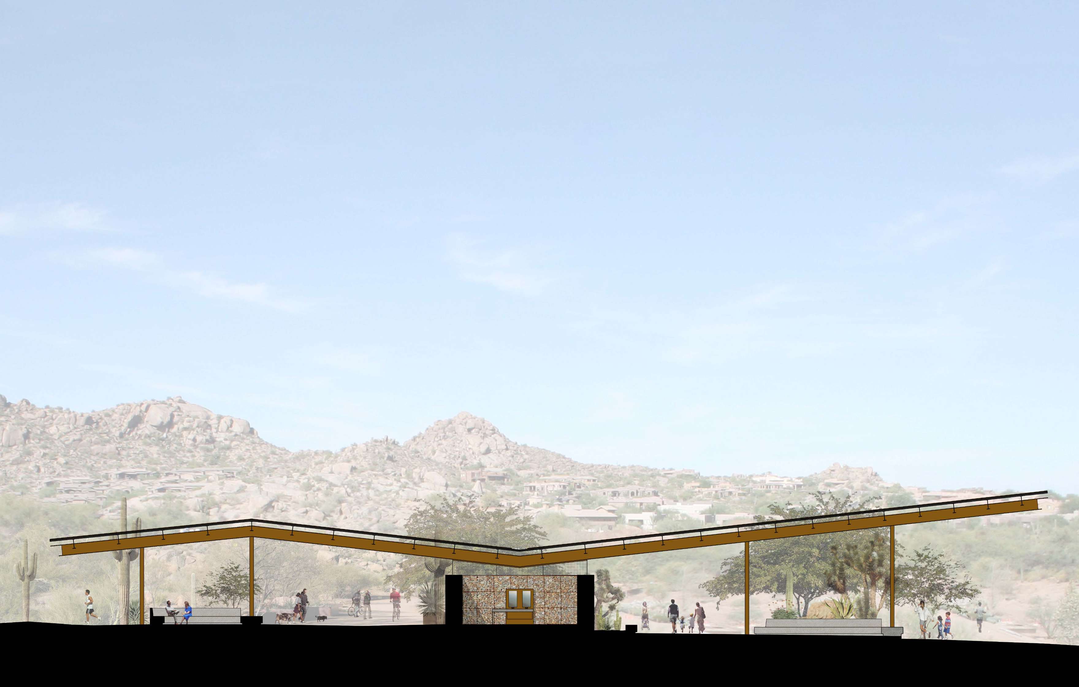 A pavilion with a slanted roof structure stands in a desert landscape with rocky hills in the background. People are visible nearby. The sky is clear.