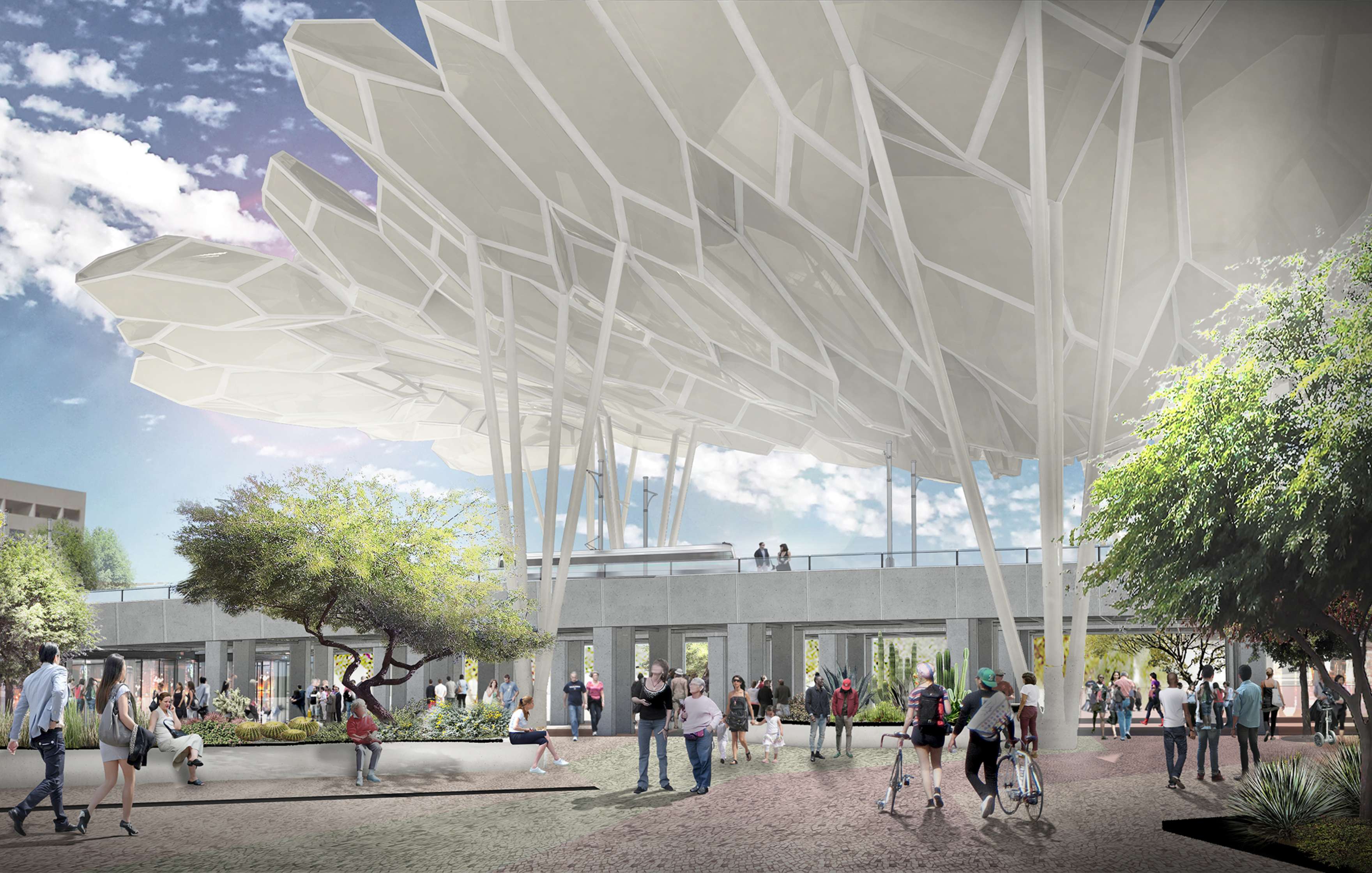 Architectural structure with large, white, leaf-like canopies. People walk and gather underneath, with trees and greenery around. Sunny day with a partly cloudy sky.